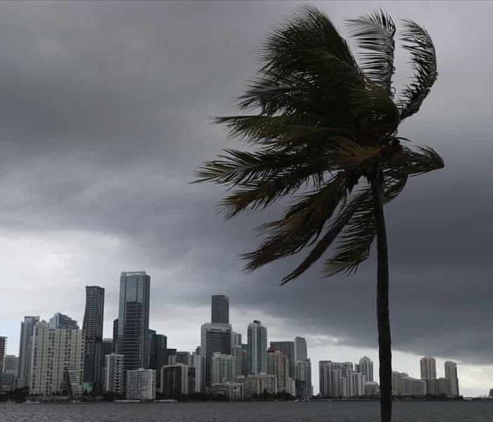 Storm clouds are seen over Miami as Hurricane Isaias approaches the east coast of Florida on Saturday. Photograph: Joe Raedle